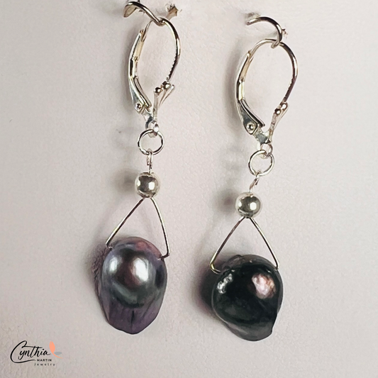 Earrings featuring exclusive dark plum freshwater pearls with elegant silver Bali bead spacers, 1 inch in height.