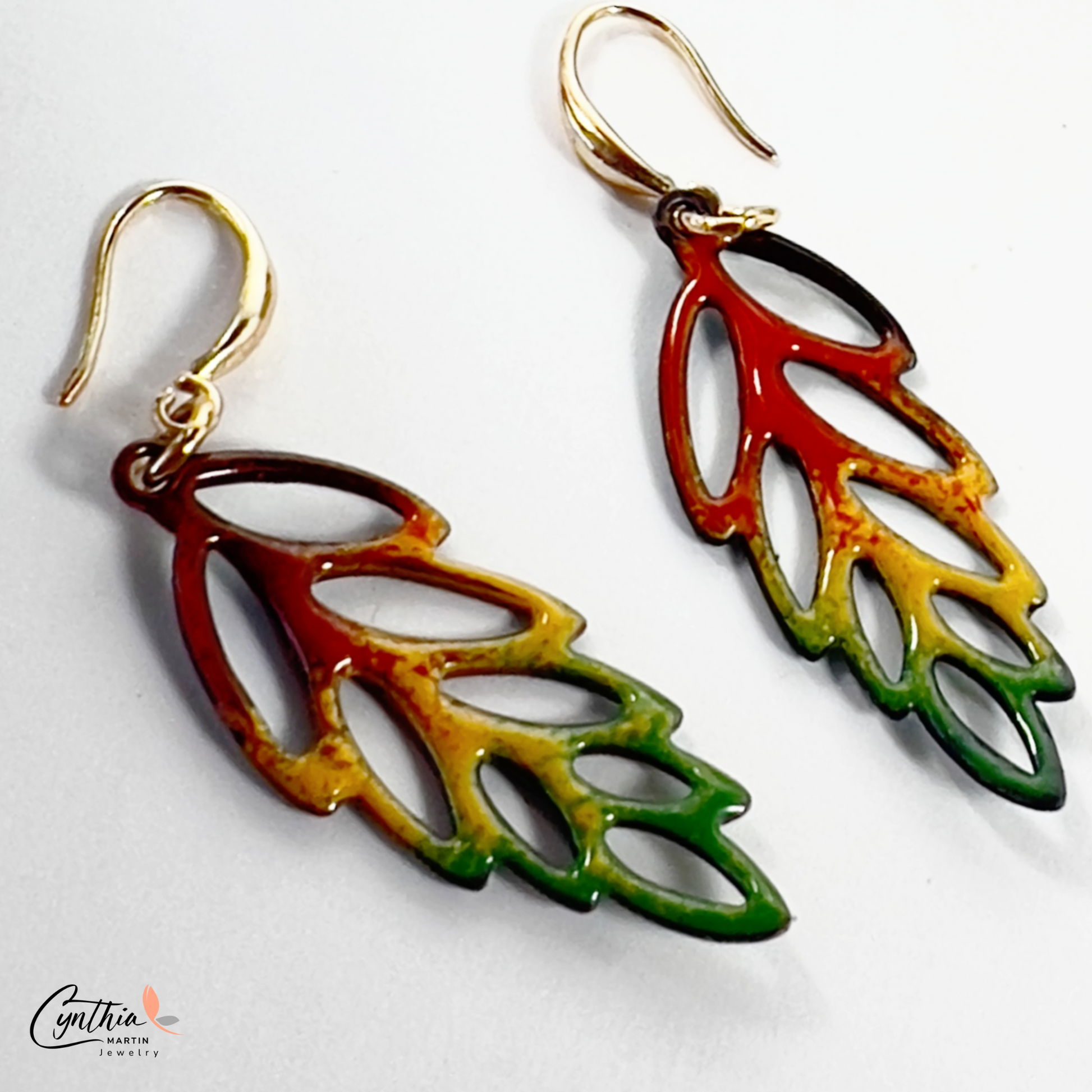 Charming enamel earrings with vibrant colors, perfect for embracing the autumn season.