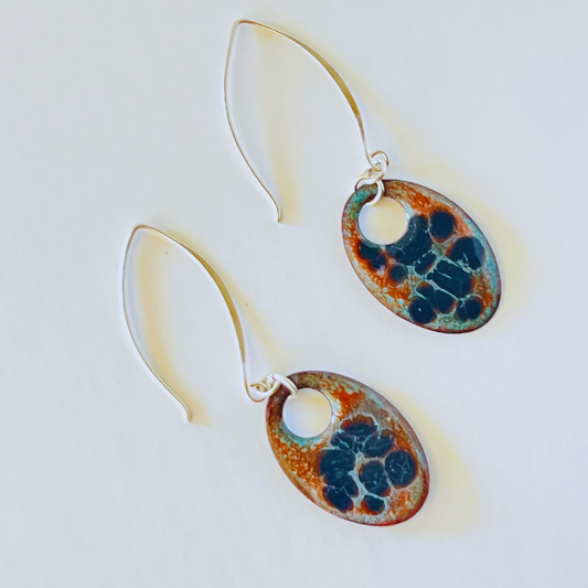 Torch-fired enamel earrings designed to look like Alligator Bark Juniper with sterling silver hoop ear wires.