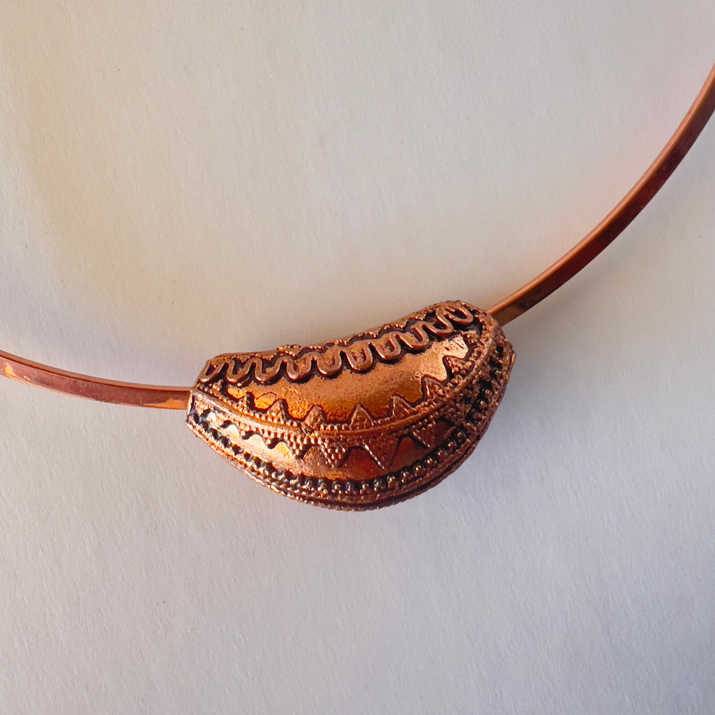 Shiny copper collar necklace with a pendant, perfect for enhancing pendants in royal blue, emerald green, fuchsia, and turquoise. Lies right on the collarbone at 15-16 inches.