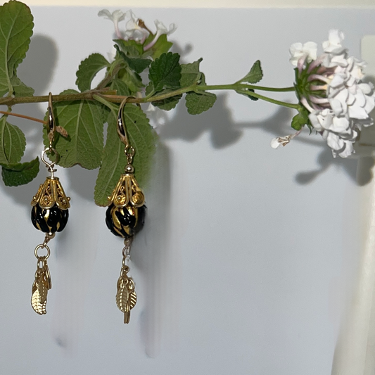 Captivating Elegance: Hand-Blown Black Murano Glass Earrings with Gold Streaks and Dangling Leaves