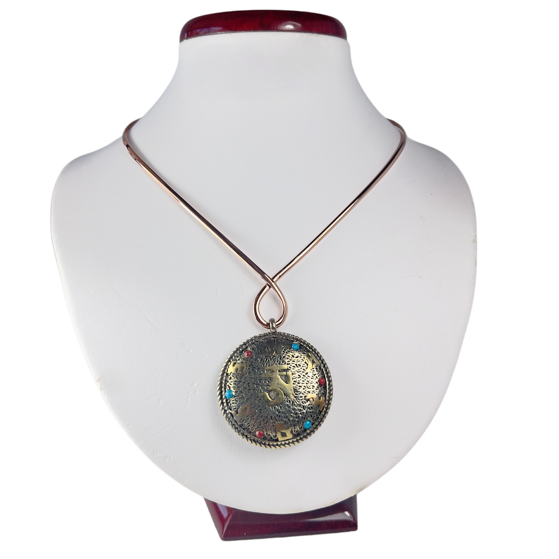 Ancient Chinese medallion pendant on a copper choker necklace.