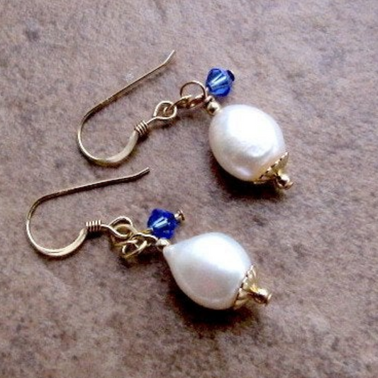 Earrings with sapphire Swarovski crystals and pearls, designed with gold-filled earwires, perfect for a Virgo baby.