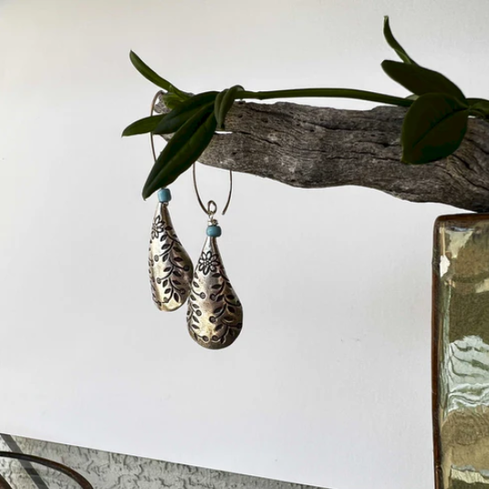 Hand-etched sterling silver pendant from Hill Tribe Village in Thailand, paired with Italian mesh chain with crystal sparkles.