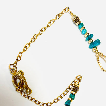 Elegant druzy pendant encased in gold vermeil, adorned with gold beads and turquoise nuggets