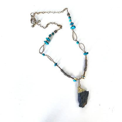 Elegant druzy pendant encased in gold vermeil, adorned with gold beads and turquoise nuggets