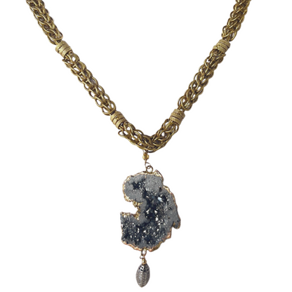 Vermeil-crusted geode pendant on a 17-inch Byzantine-style brass necklace with an accent bead featuring crystal inlay.