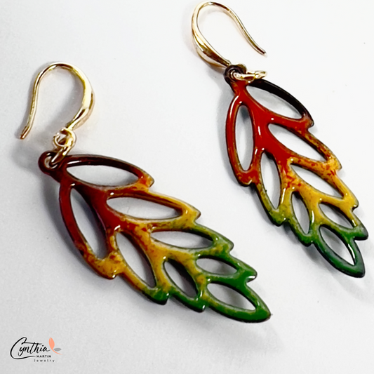 Charming enamel earrings with vibrant colors, perfect for embracing the autumn season.
