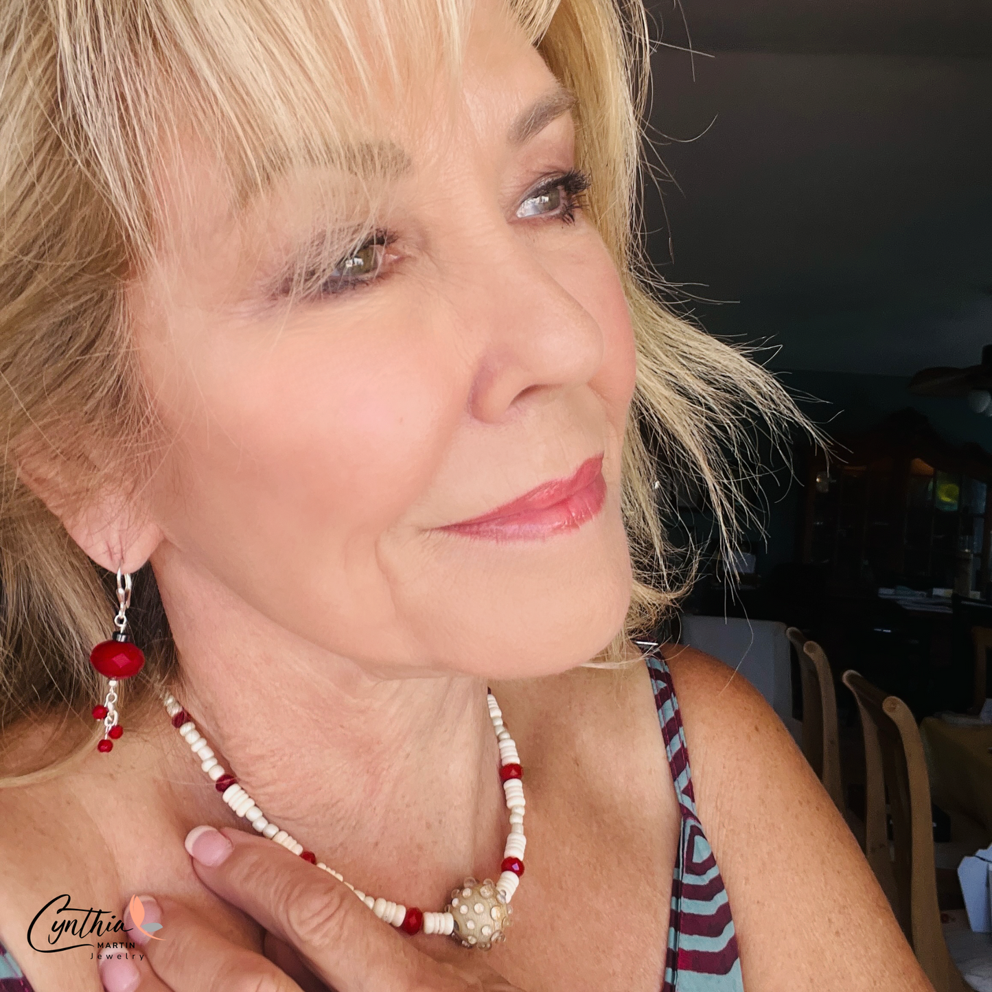 Hand-crafted ceramic bead necklace with glossy white beads, ruby-red rondelles, and white bone heishi beads, 15 inches with 2-inch extender.
